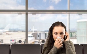 sick woman calling doctor urgently at the airport